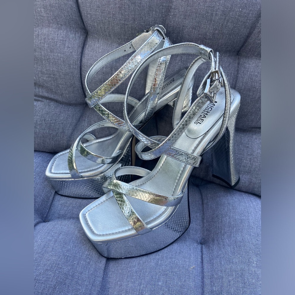 Preowned Sexy Michael Kors silver platform shoes, size 7.5 true to the size.